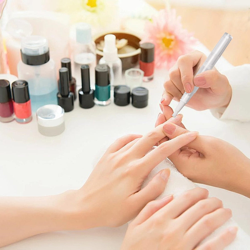 Olutacot nail oil pen with brush tip for smooth liquid application.