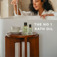 OLVERUM bath oil in bathwater showing soothing aroma diffusion during soak