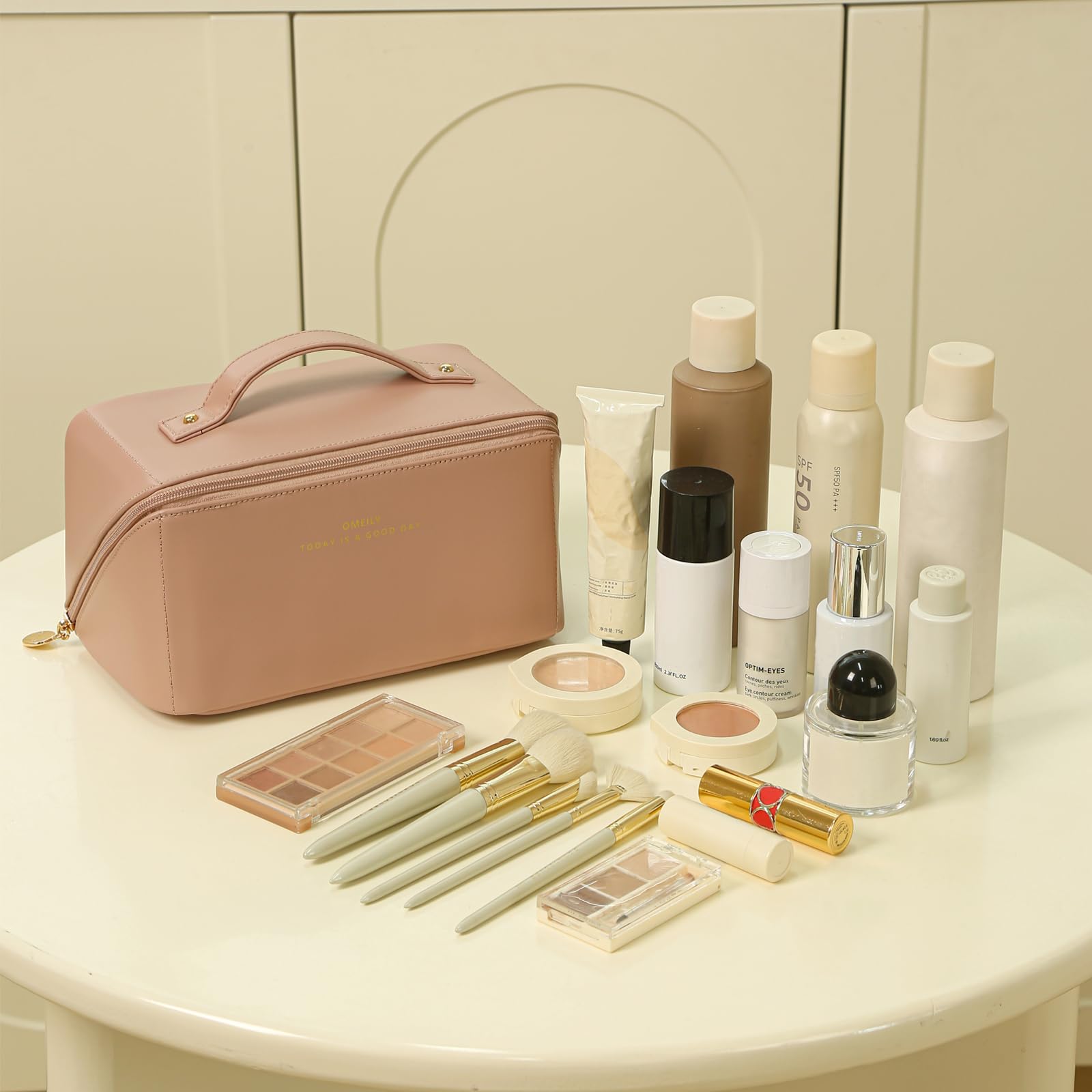 Omeily travel makeup bag compartments highlighting five sections for organized cosmetics on the go.