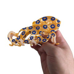 OMG Decor novelty blue-ringed octopus clip worn in hair for quick tidy.