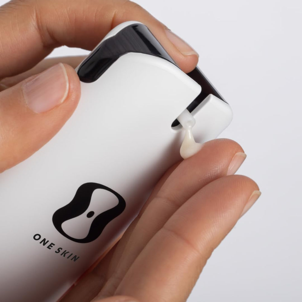 OneSkin FACE OS-01 Mini bottle pump close-up for easy application