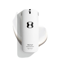 OneSkin OS-01 Face bottle close-up shows fragrance-free formula for sensitive skin and daily hydration.