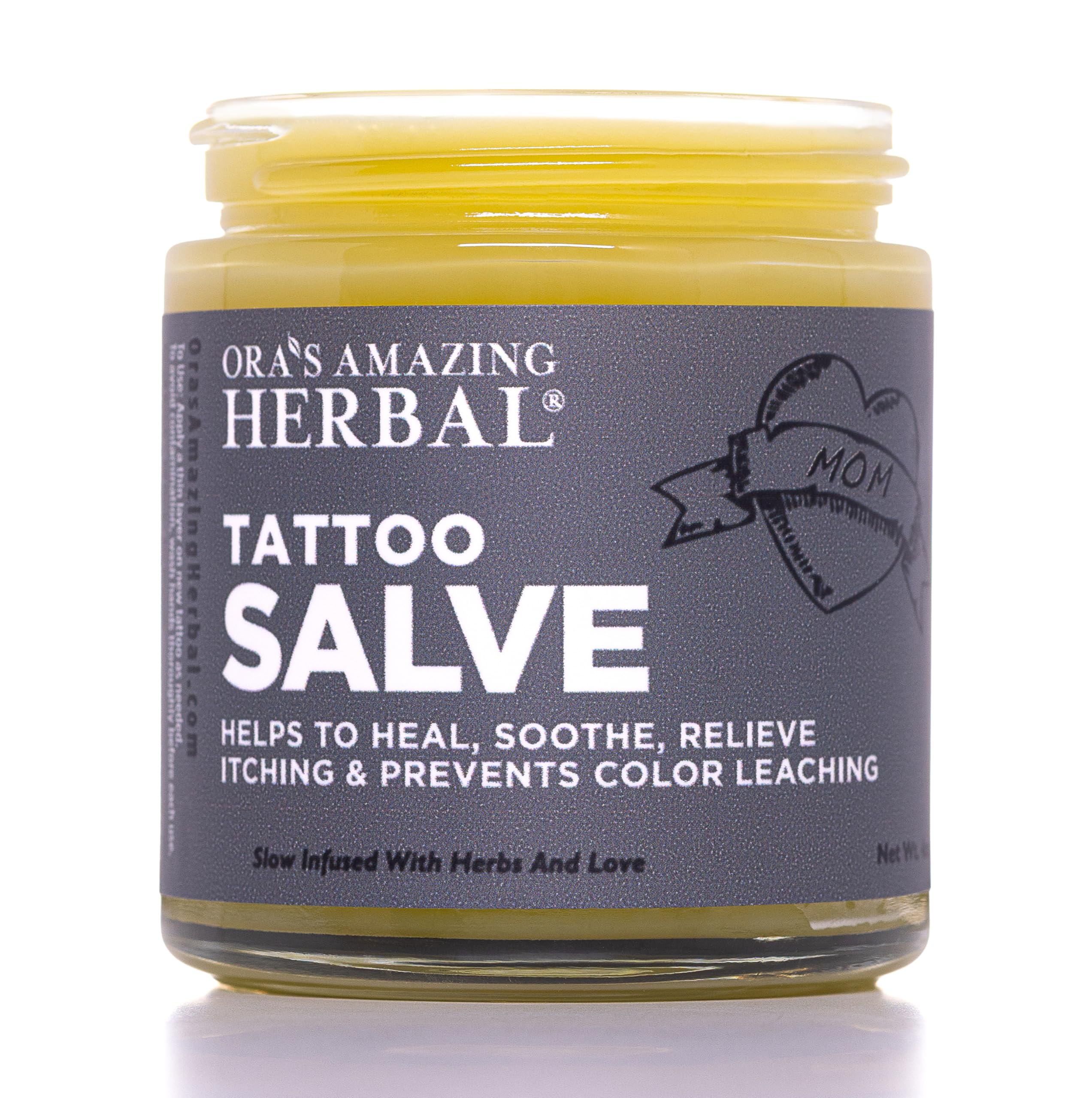 Ora's Amazing Herbal Tattoo Salve glass jar for premium tattoo aftercare and hydration.