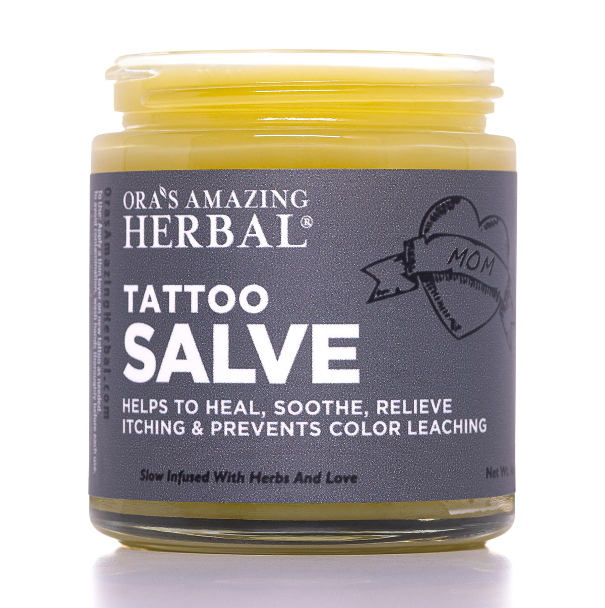 Ora's Amazing Herbal Tattoo Salve glass jar for premium tattoo aftercare and hydration.