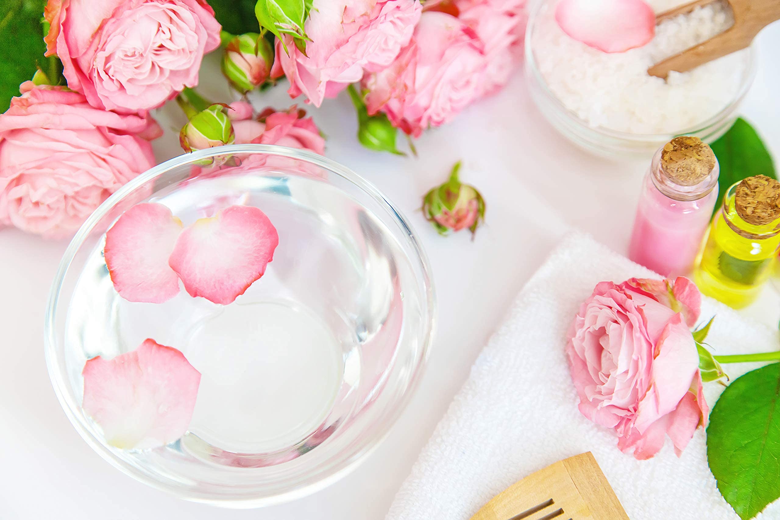 Organic Pure Oil Rose Hydrosol Water bottle—calming post-sun care and gentle skin relief.