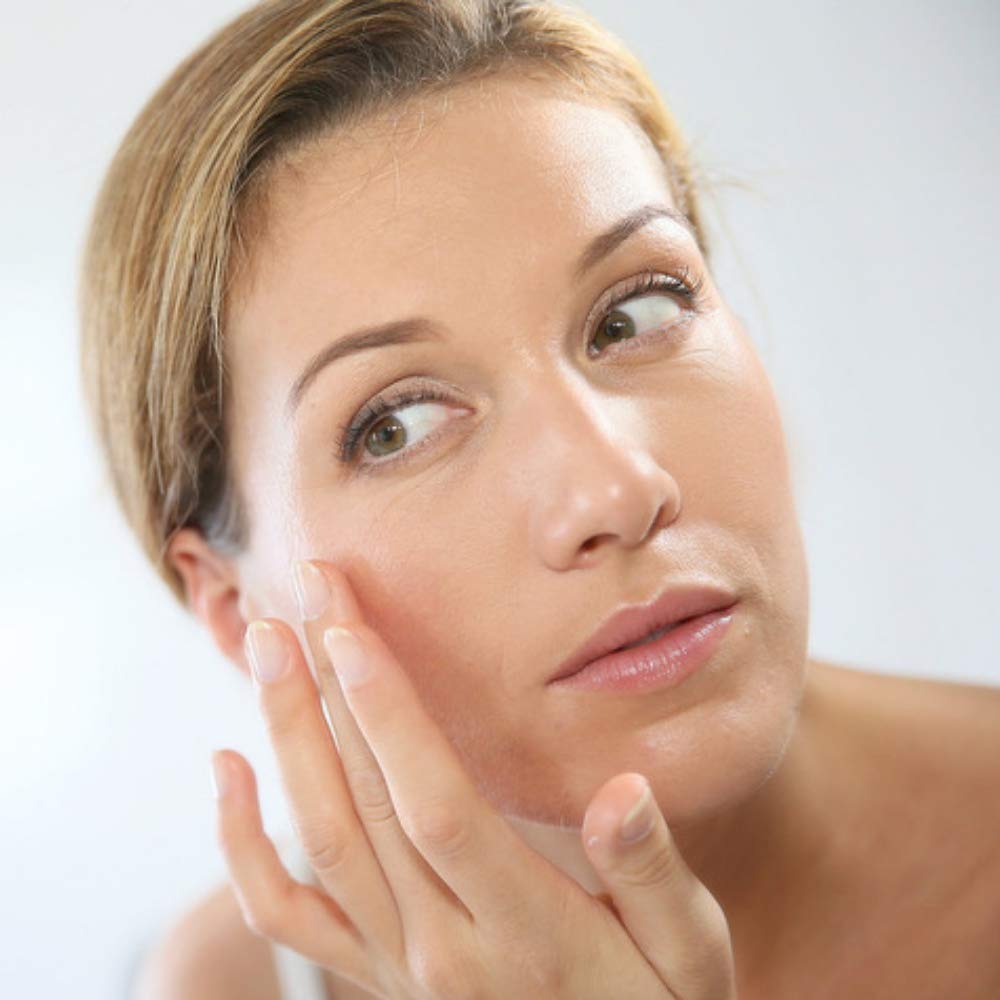 Organys Spark Rejuvenating Eye Formula cream texture swatch showing brightening and smoothing.
