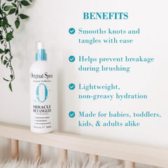 Original Sprout Miracle Detangler Spray being applied with brush to smooth knots.