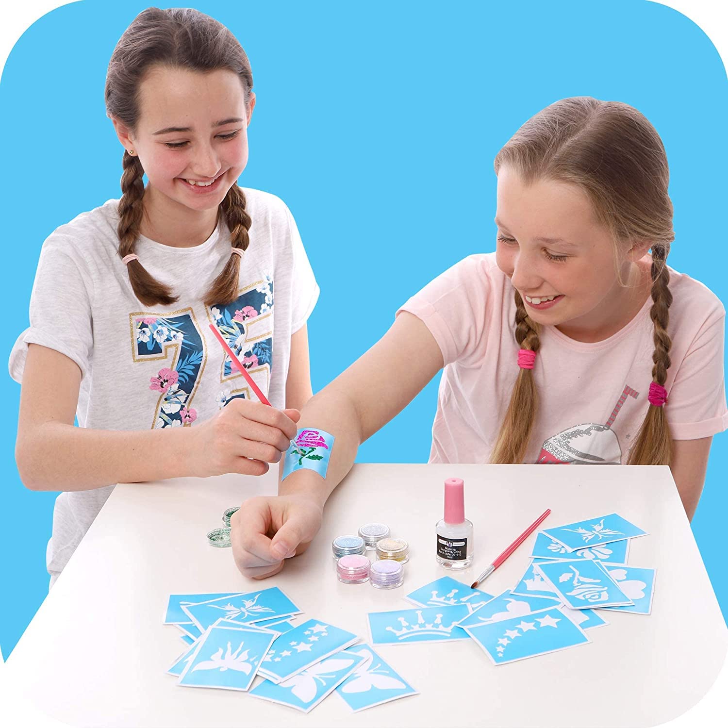 Original Stationery glitter tattoo kit sample designs showing creative possibilities