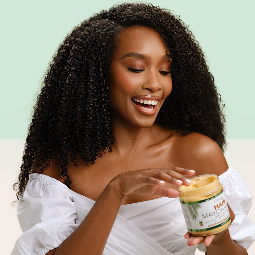 Originals by Africa's Best damage-repair hair visual suggests rejuvenated elasticity after treatment.
