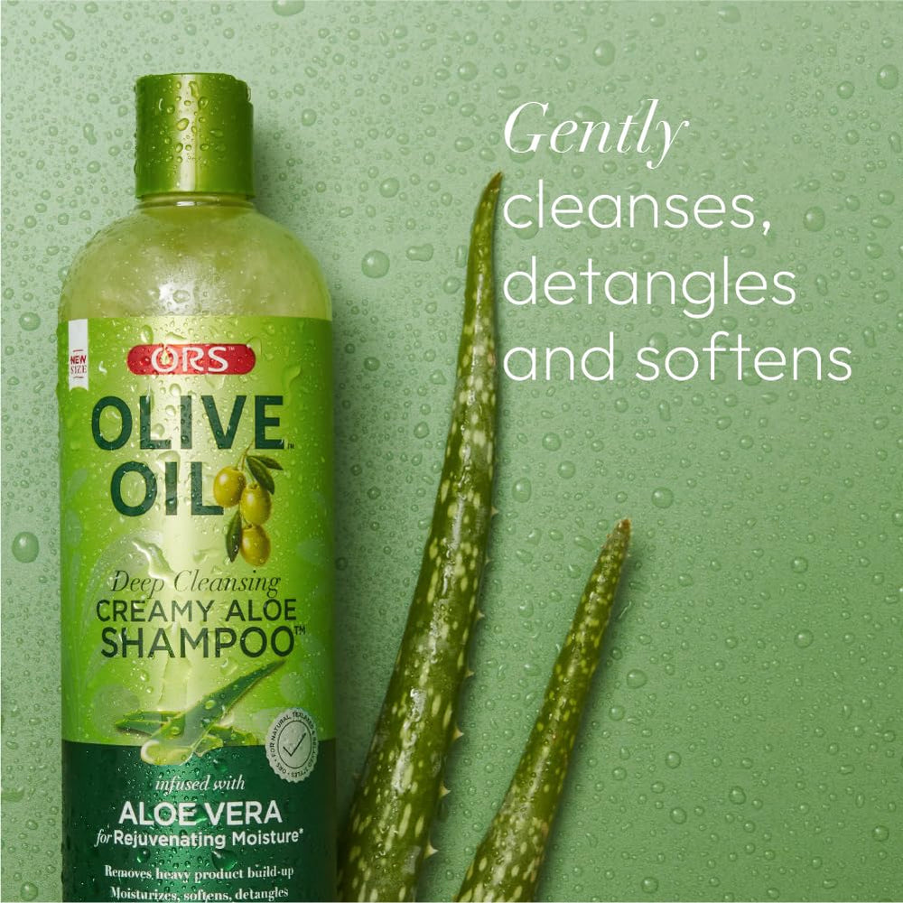 ORS Olive Oil Moisture Restore detangling action captured during brushing.