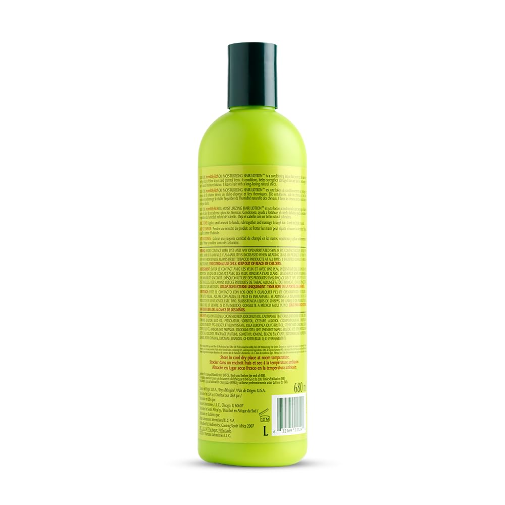 ORS Olive Oil Professional bottle near flat-iron to suggest heat protection.