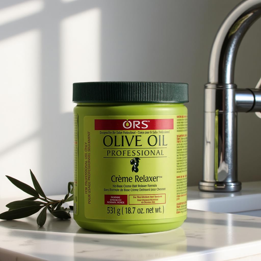 ORS Olive Oil Relaxer bottle with olive motif emphasizes natural oil protection during processing.