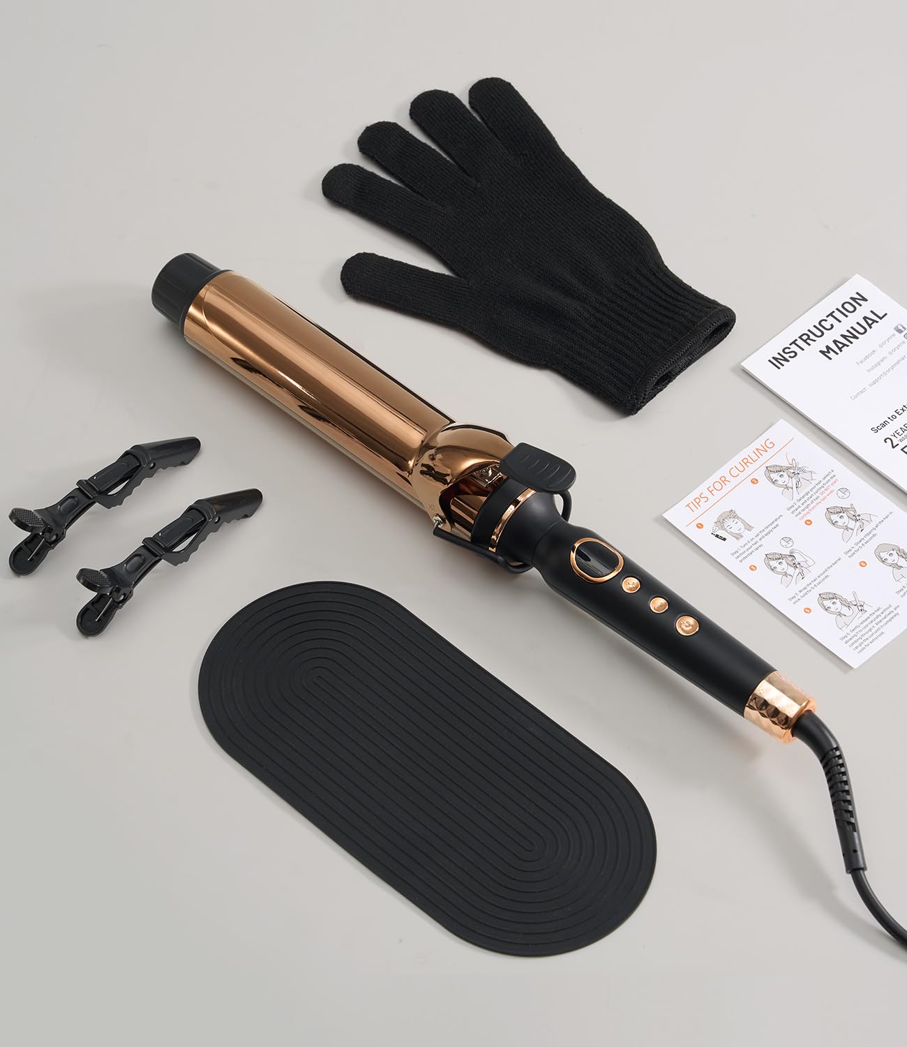 ORYNNE Titanium 2-Inch Curling Iron heat-resistant mat and glove protect surfaces during use.