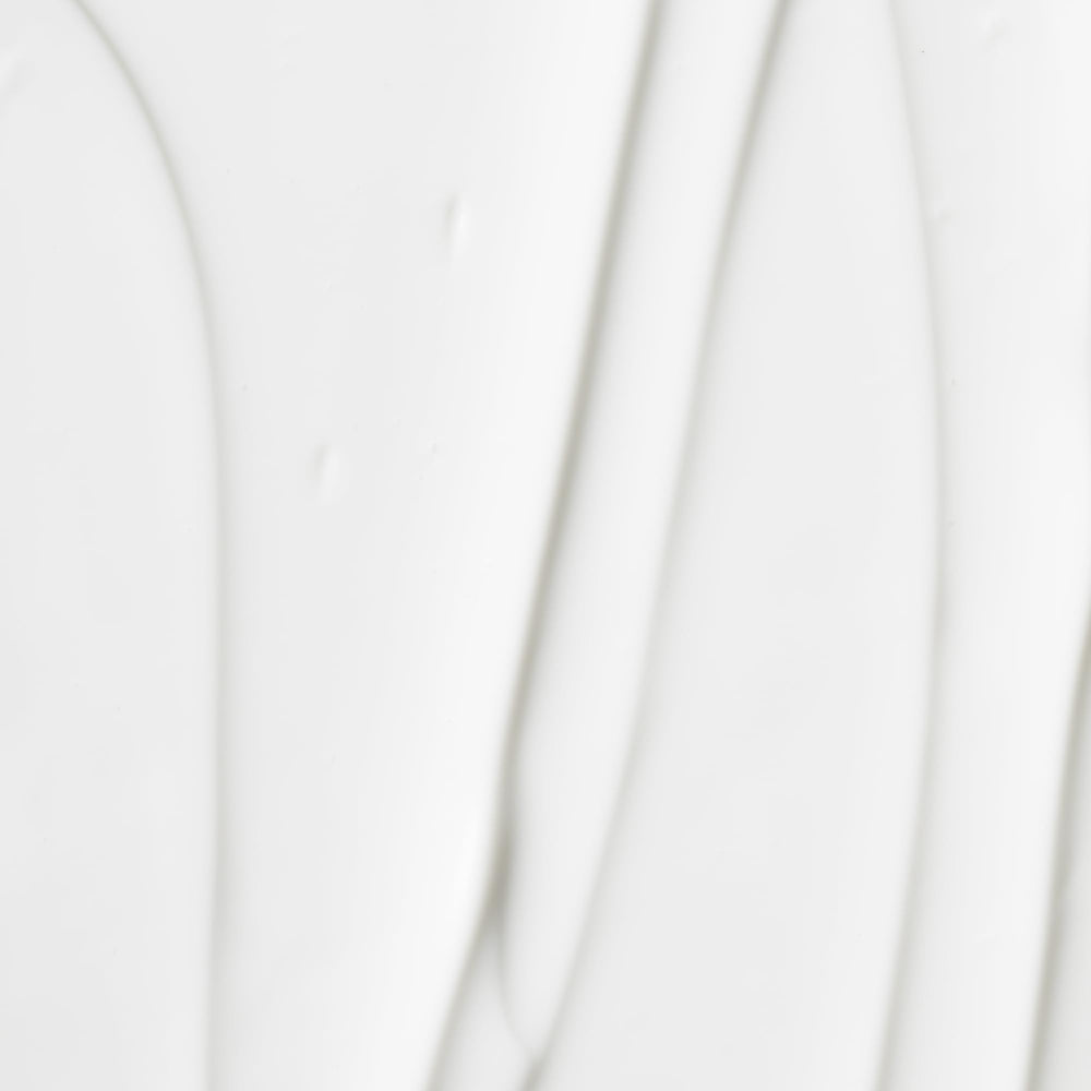 OSEA Atmosphere Protection Cream texture swirl highlights fast-absorbing, non-greasy finish