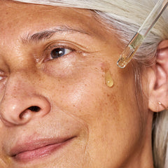 OSEA Hyaluronic Acid Sea Serum texture closeup reveals silky, fast-absorbing serum on skin.