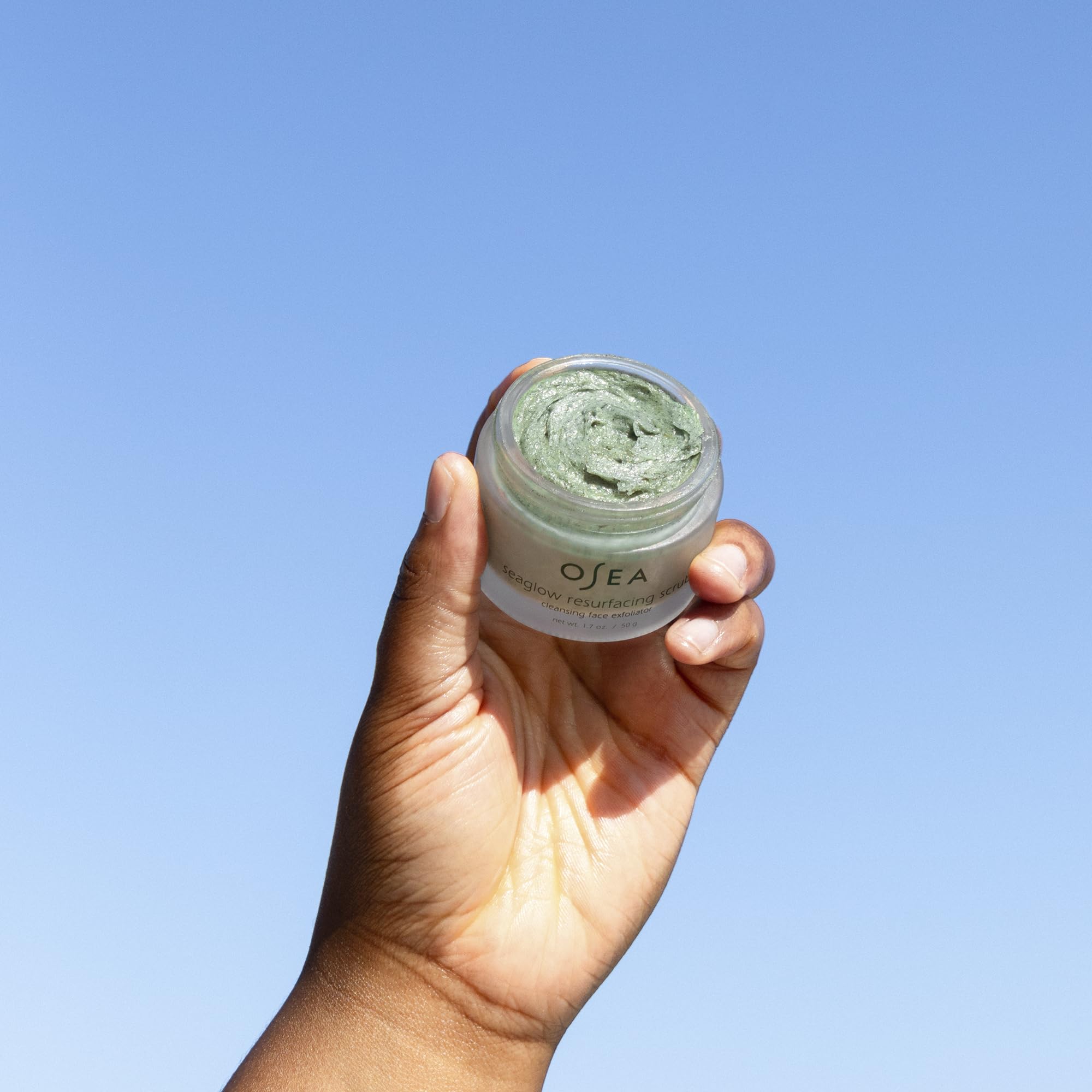 OSEA Seaglow ingredient close-up shows flower acids and oceanic exfoliants.