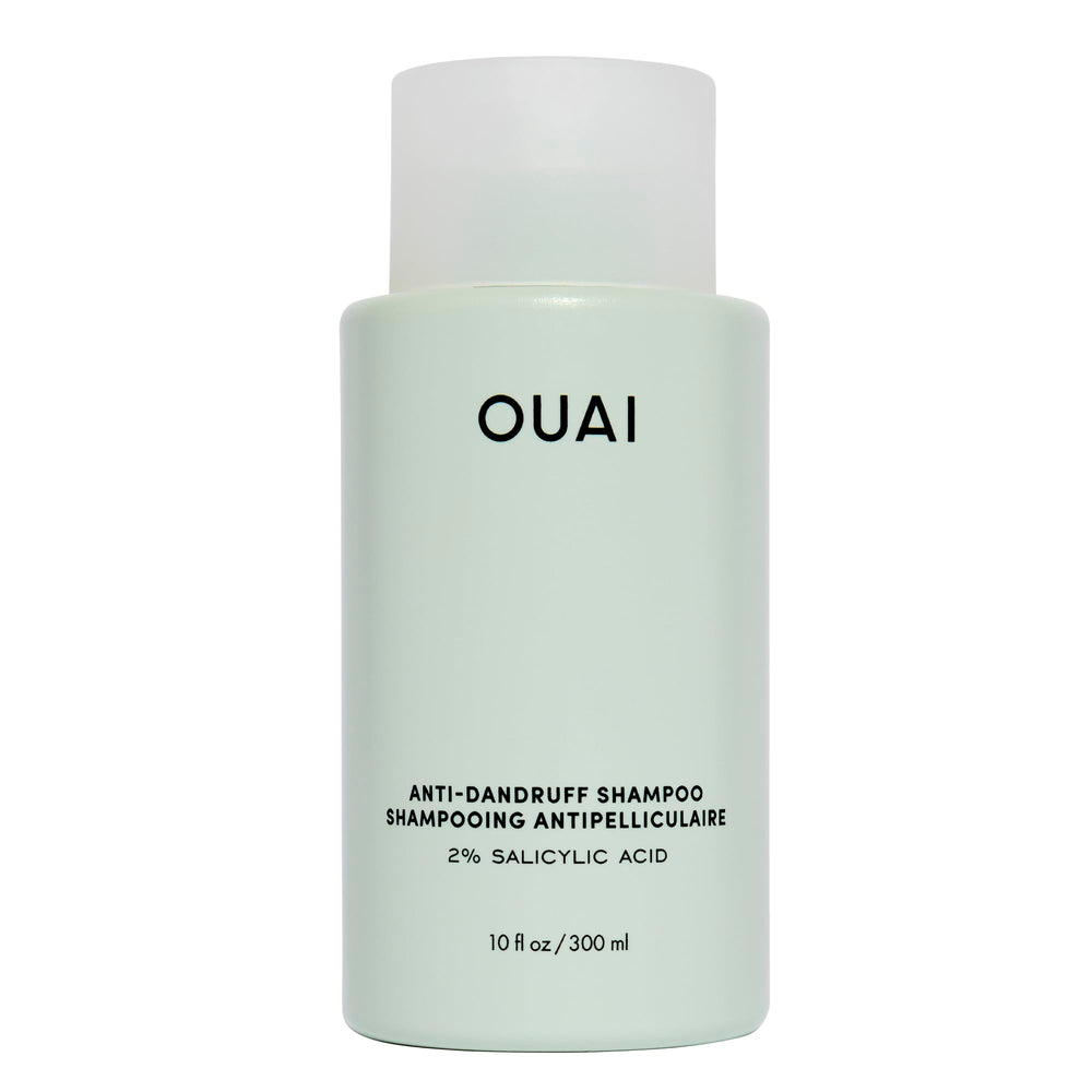 OUAI anti-dandruff shampoo bottle highlighting gentle scalp care