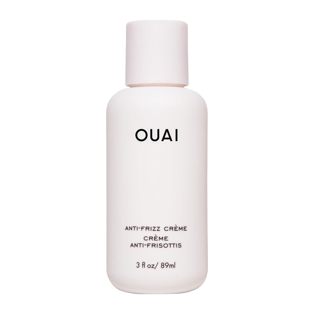 OUAI Anti Frizz Cream travel-size packaging for on-the-go frizz control.