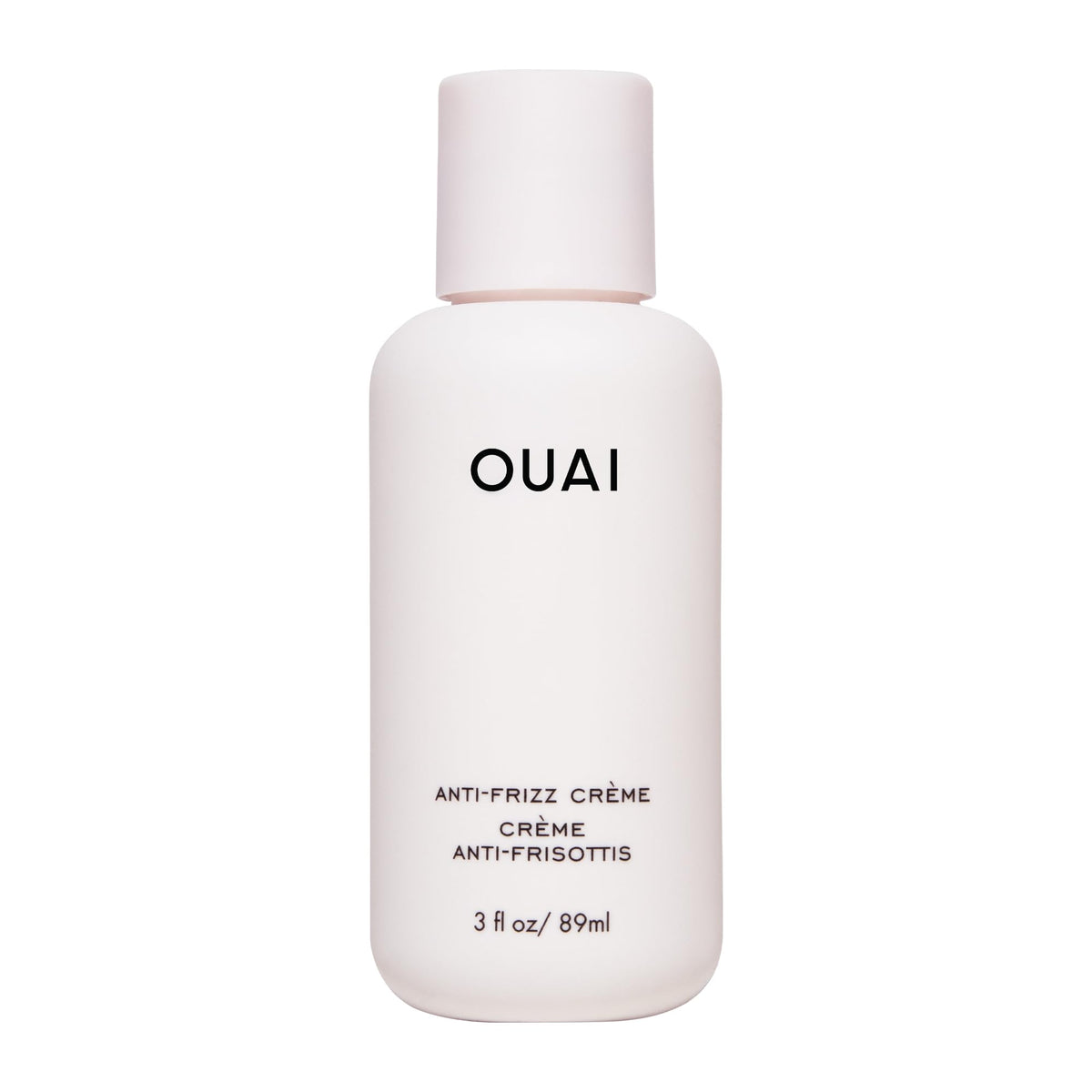 OUAI Anti Frizz Cream travel-size packaging for on-the-go frizz control.