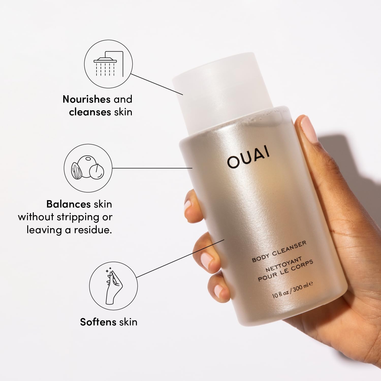 OUAI Body Cleanser Dean Street creamy lather close-up promotes a pampering at-home shower experience.