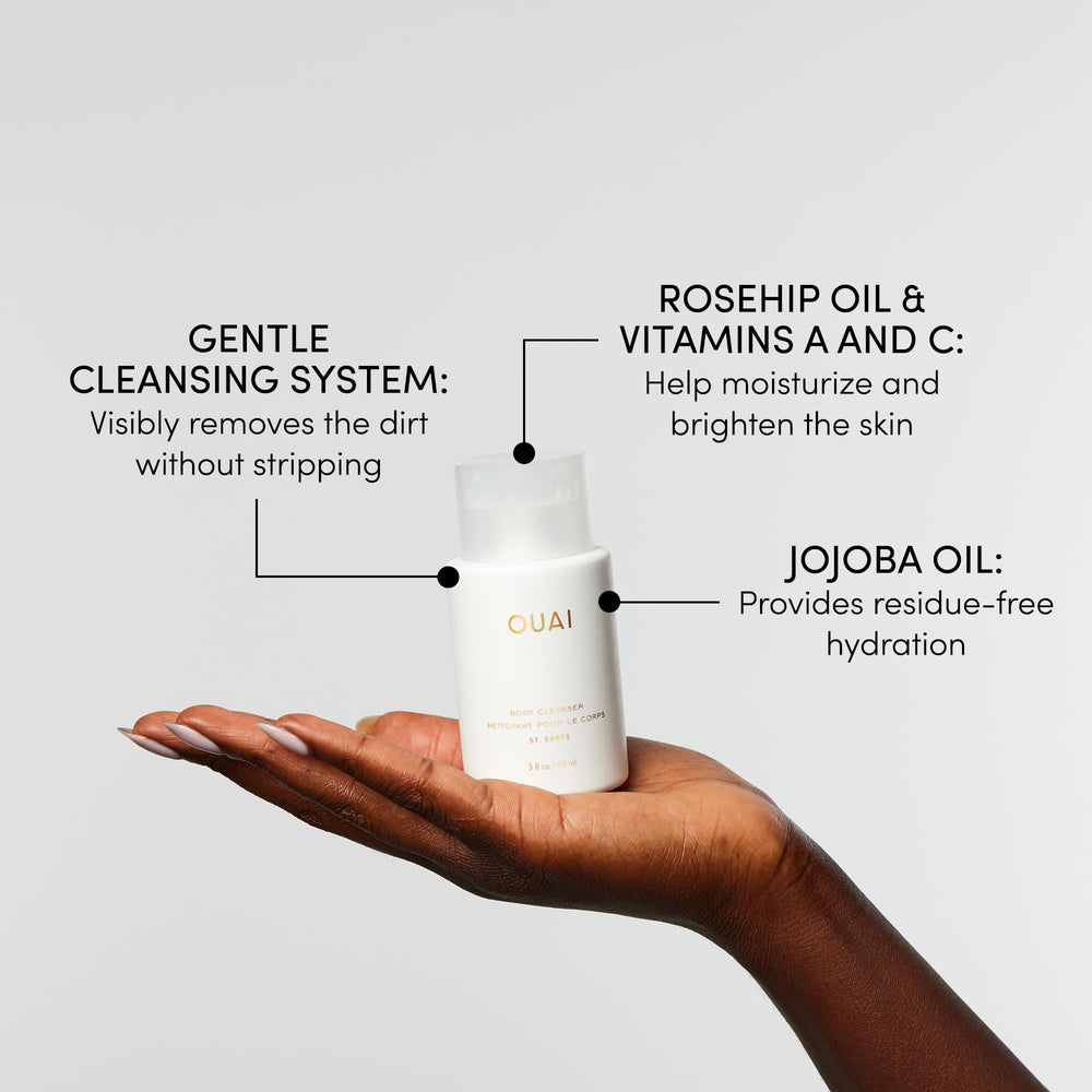 OUAI Body Cleanser floral fragrance bubbles evoking spa-like shower.