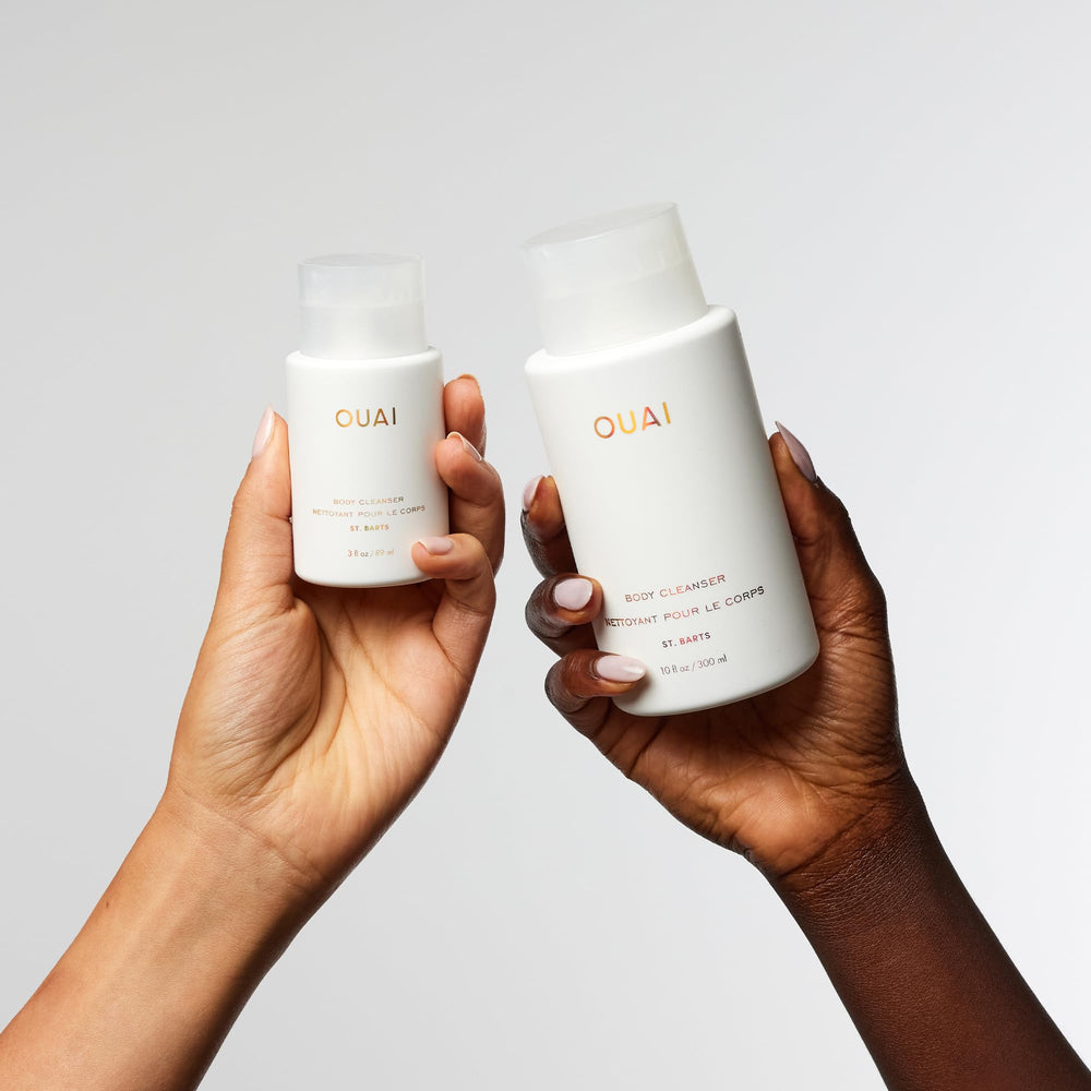 OUAI Body Cleanser jojoba-oil droplets indicating non-greasy hydration.