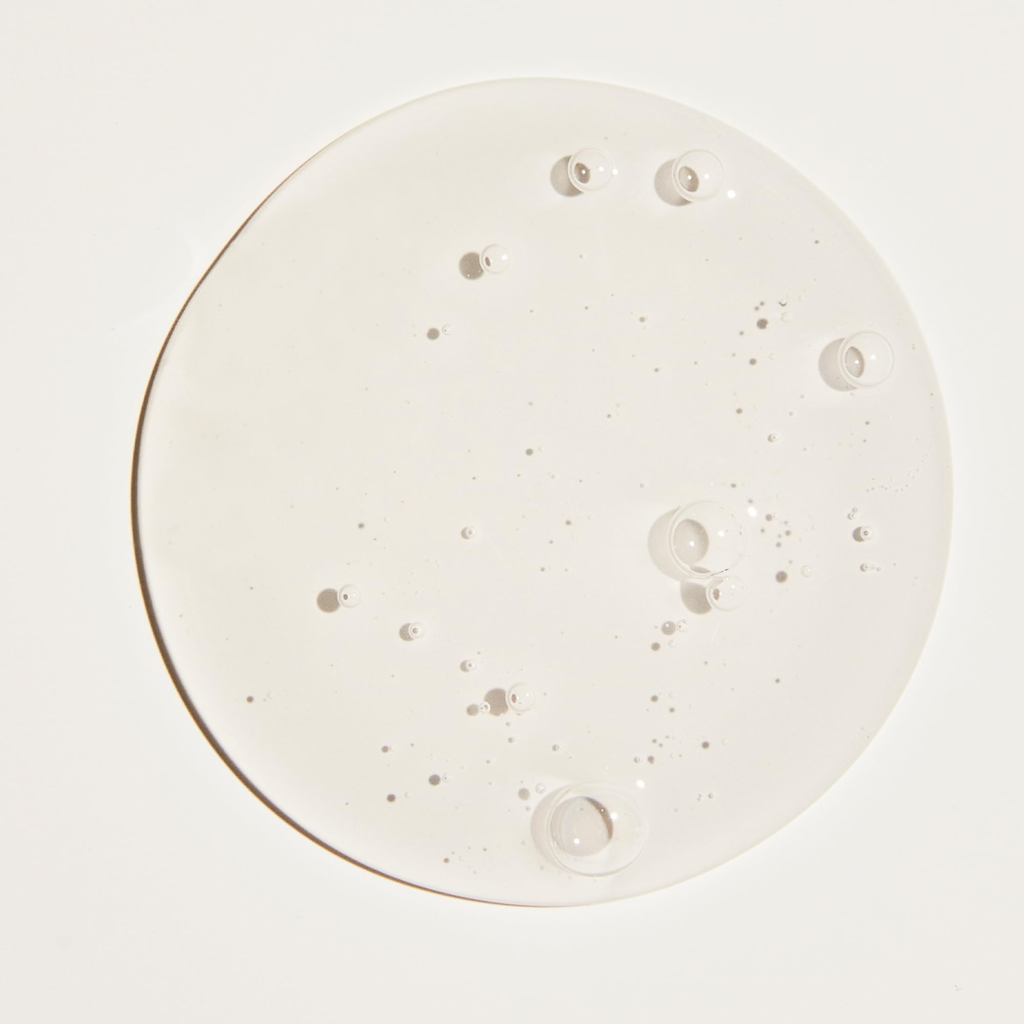 OUAI Body Cleanser shower scene suggesting home-spa routine.