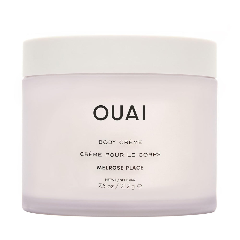 OUAI Melrose Place Body Cream bottle pouring for easy application and hydration.