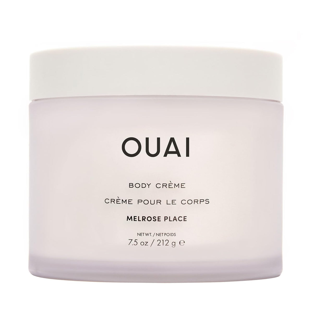 OUAI Melrose Place Body Cream bottle pouring for easy application and hydration.