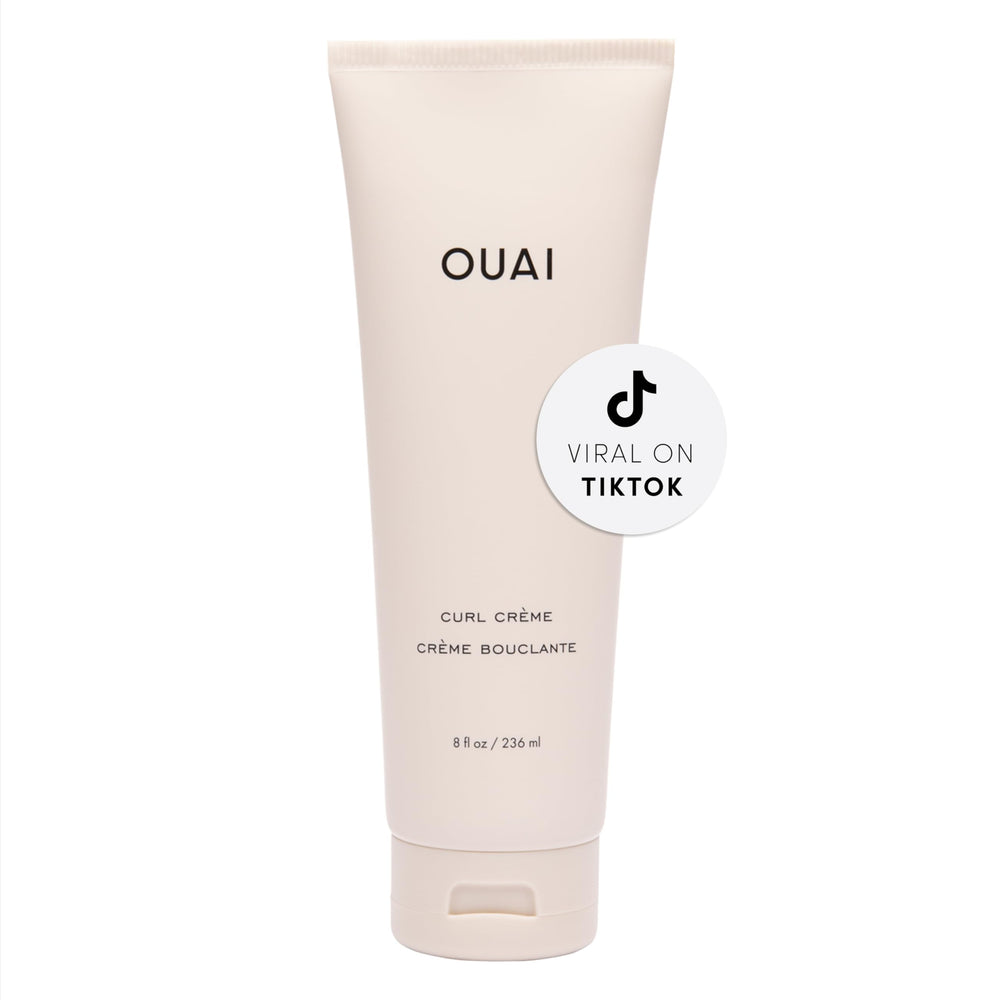 OUAI Curl Cream bottle closeup, silicone-free formula for defined, hydrated curls.