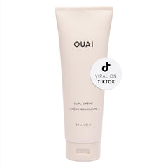 OUAI Curl Cream bottle closeup, silicone-free formula for defined, hydrated curls.