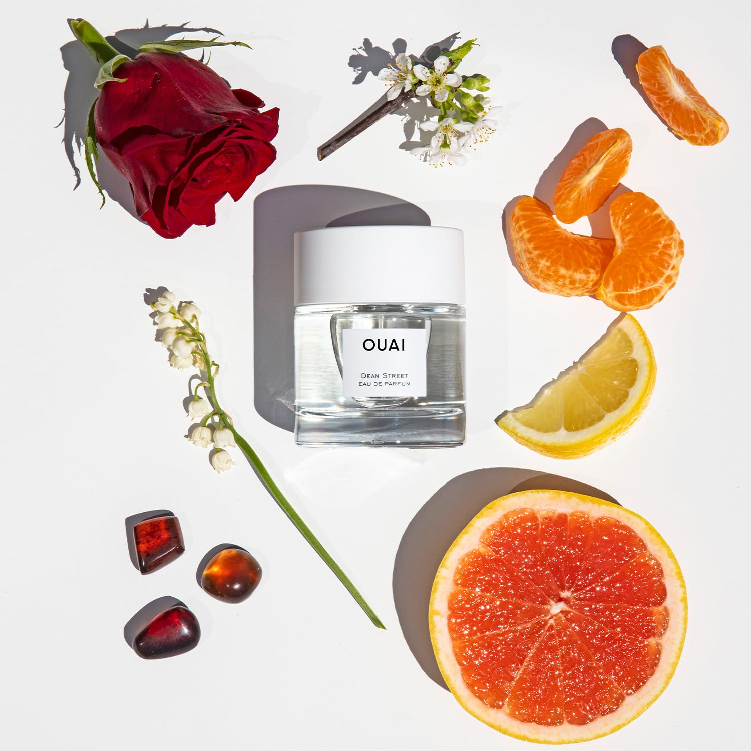OUAI Dean Street EDP bottle with soft glow for office-to-evening transitions.
