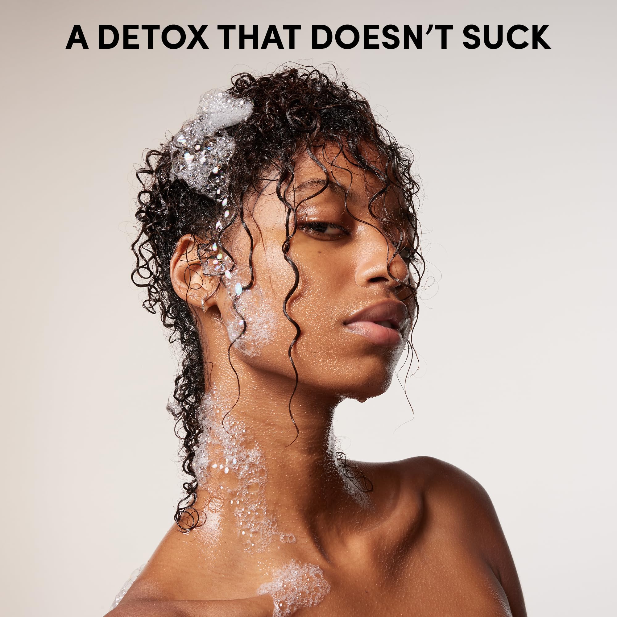 OUAI Detox and Medium Conditioner label closeup – premium formula details for detox and hydration