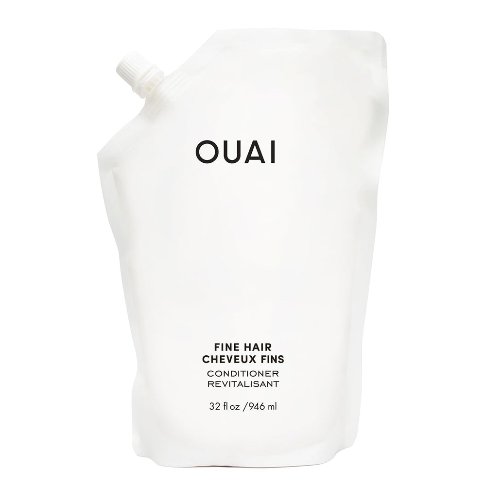 OUAI Fine Hair Conditioner Refill bottle closeup showing potential soft volume