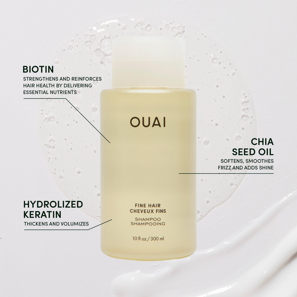 OUAI Fine Shampoo travel-size bottle pouring lather for clean, bouncy strands
