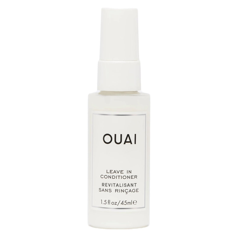 OUAI leave-in conditioner bottle demonstrating heat protection for styling sessions