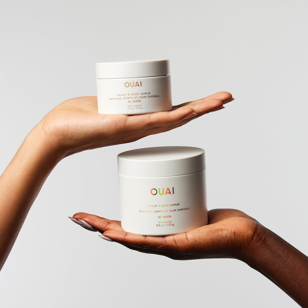 OUAI massage action on skin demonstrates exfoliation and moisture balance.