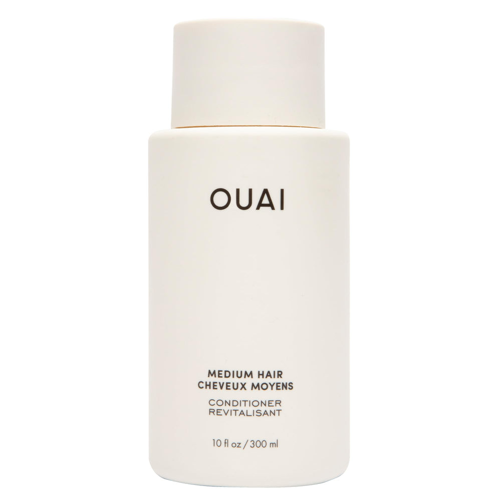OUAI Medium Conditioner bottle front view for hydrated, frizz-controlled hair.