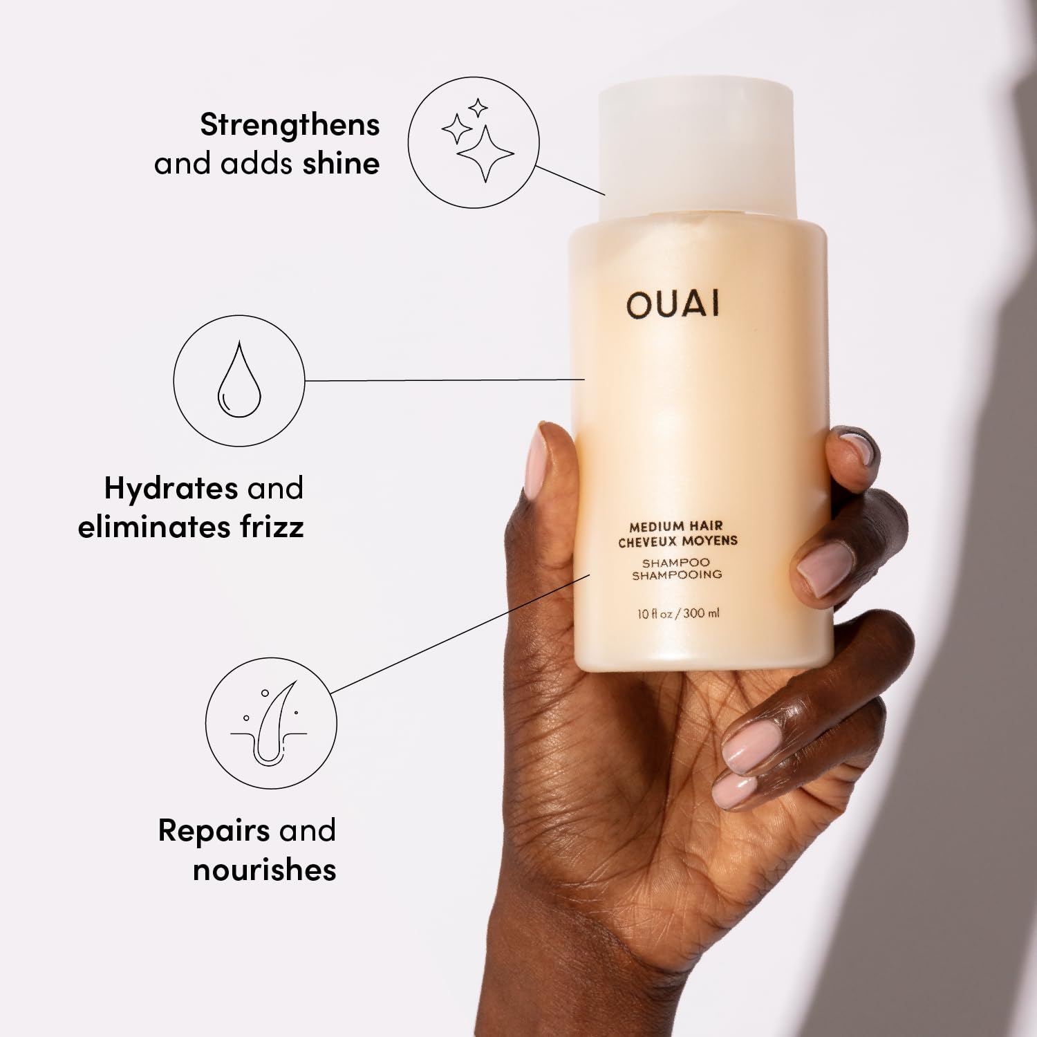 OUAI Medium Shampoo bottle closeup highlighting keratin infusion