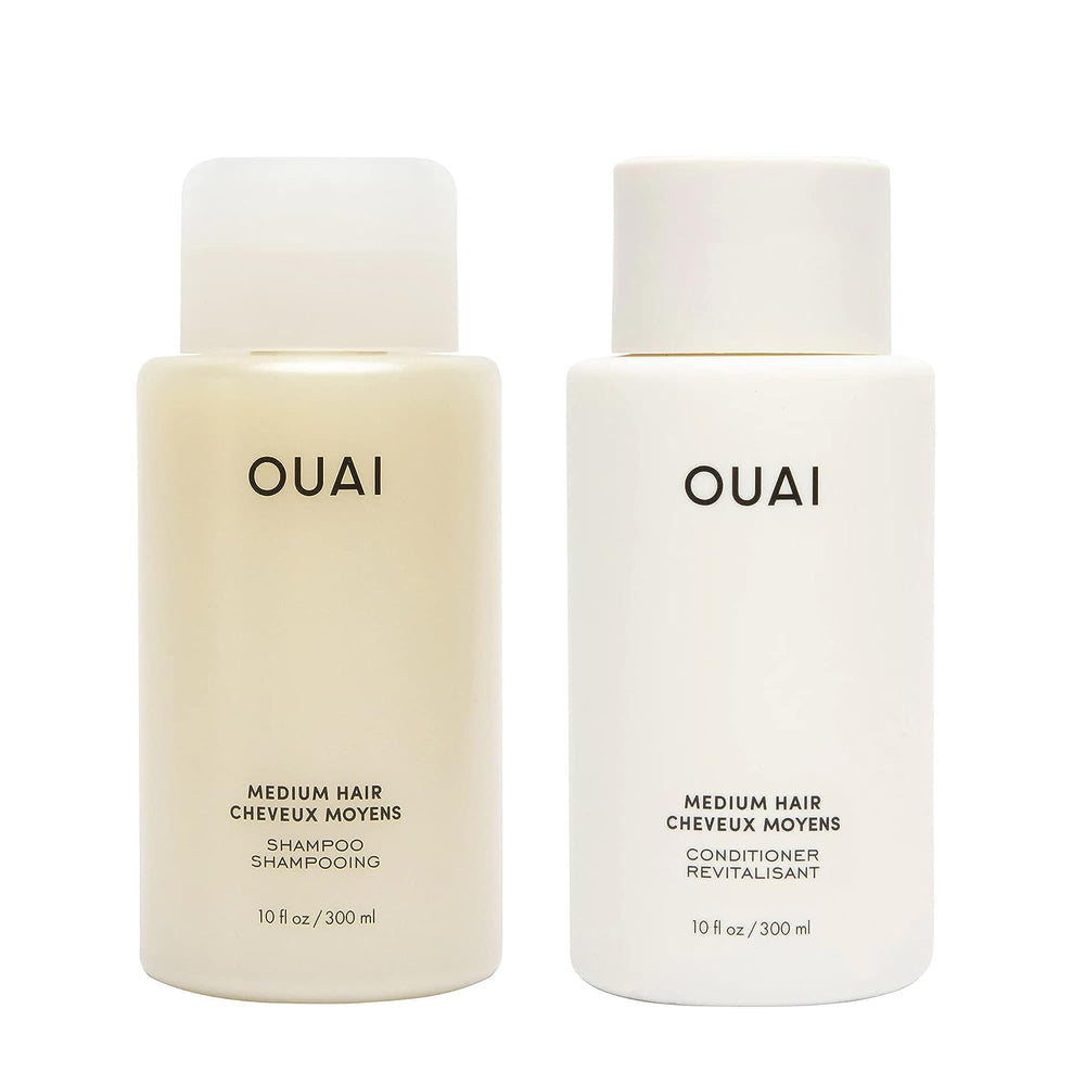OUAI Medium Shampoo bottle pour showing cleansing action for smoother hair