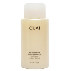 OUAI Medium Shampoo bottle highlights coconut oil hydration