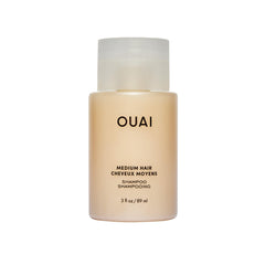 OUAI Medium Shampoo Travel Size bottle front view, a compact travel-friendly packaging.