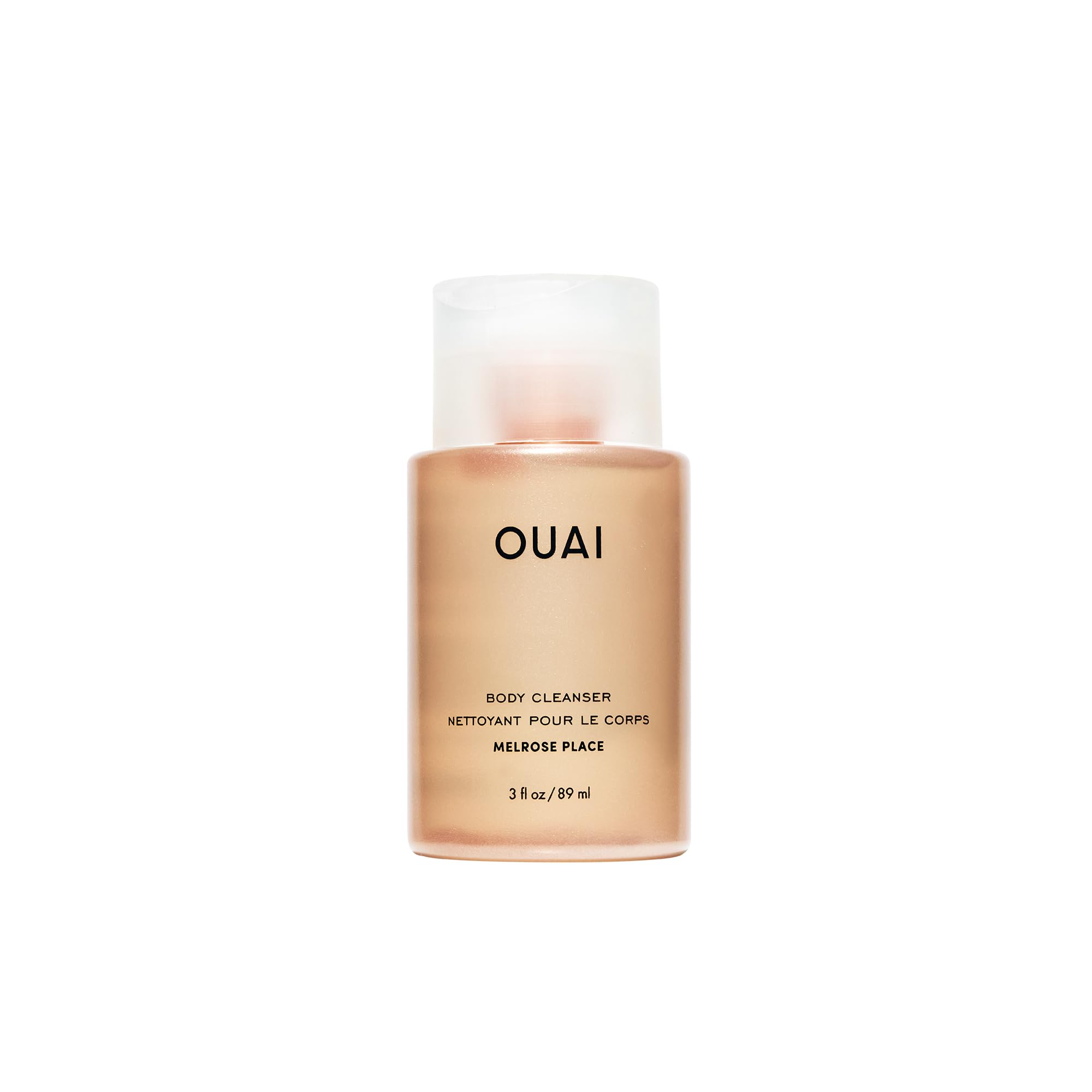 OUAI Melrose Place travel-size bottle pour shows hydrating cleanse on the go.