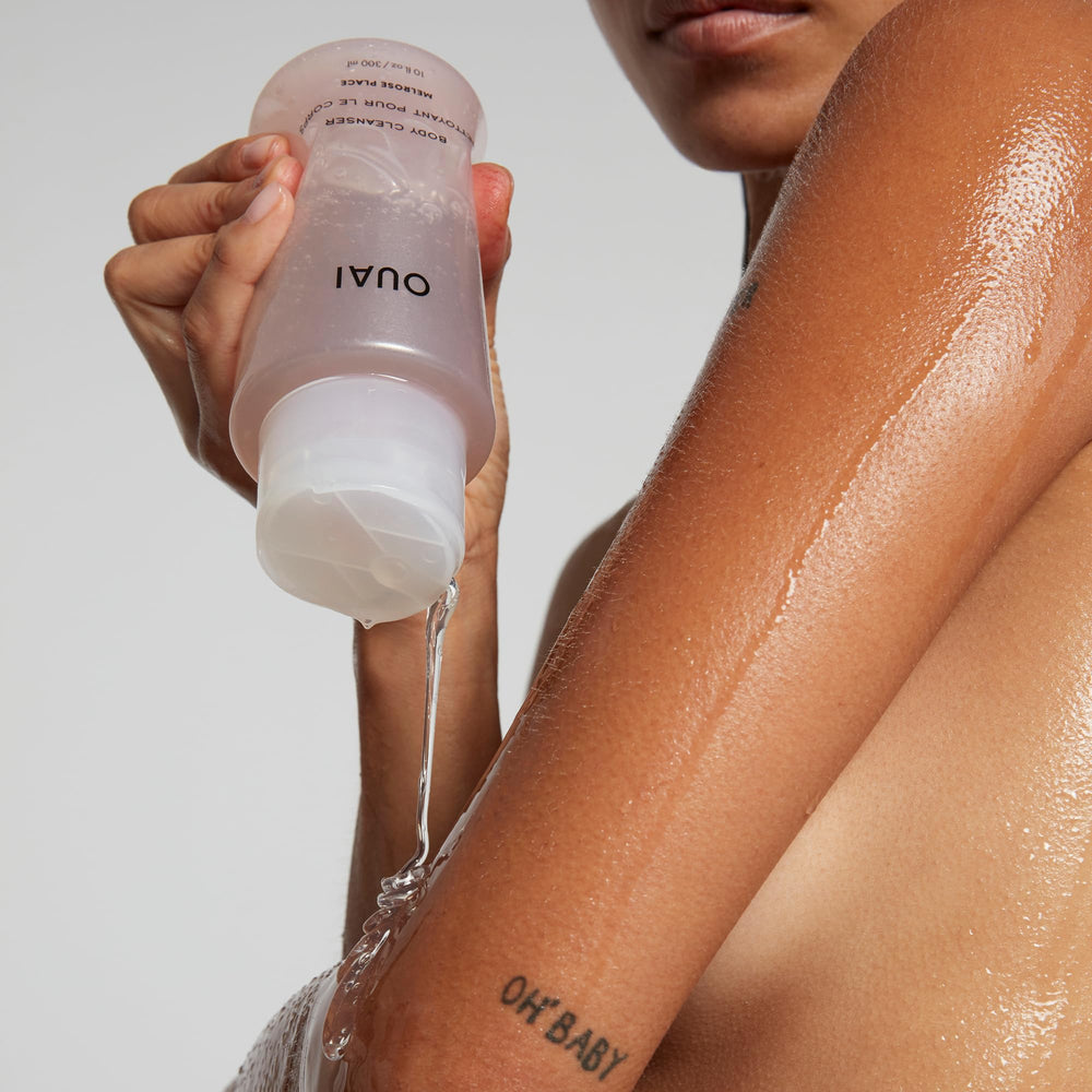 OUAI Rosehip oil hydration closeup highlights antioxidant nourishment for skin.