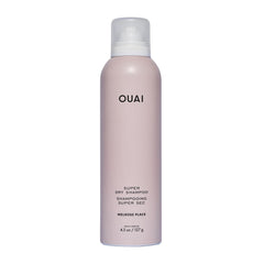 OUAI Super Dry Shampoo spray can at distance demonstrates oil absorption from roots