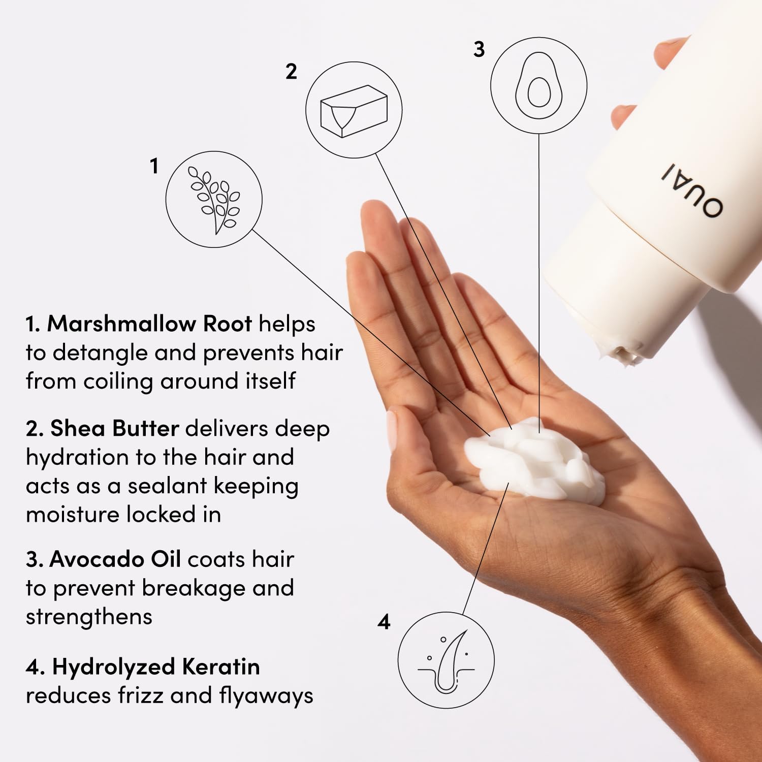 OUAI Thick Hair Conditioner being applied on wet hair for detangling and frizz control