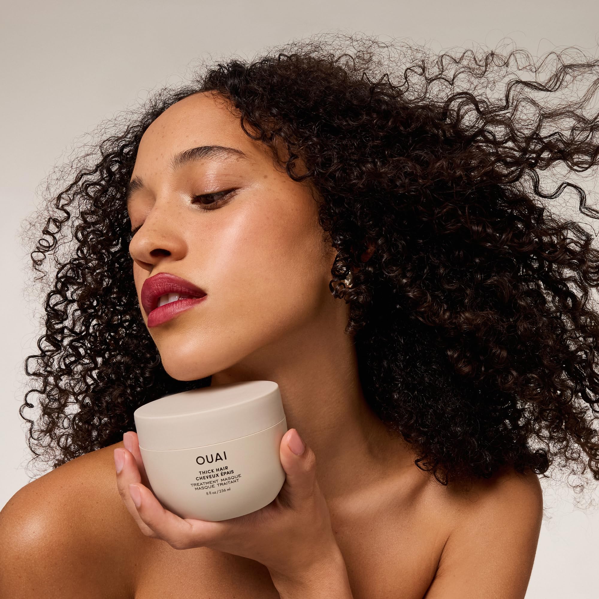 Before and after texture with OUAI Thick Hair Mask showing frizz control.