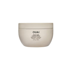 OUAI Thick Hair Mask bottle delivering deep moisture for thick hair.