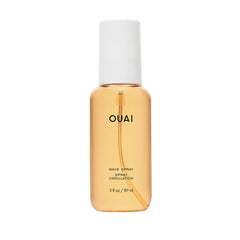 OUAI Travel Size Wave Spray bottle for on-the-go texture and shine.