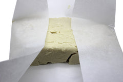 Our Earth's Secrets Ivory Shea Butter nutty aroma ready for lotions.